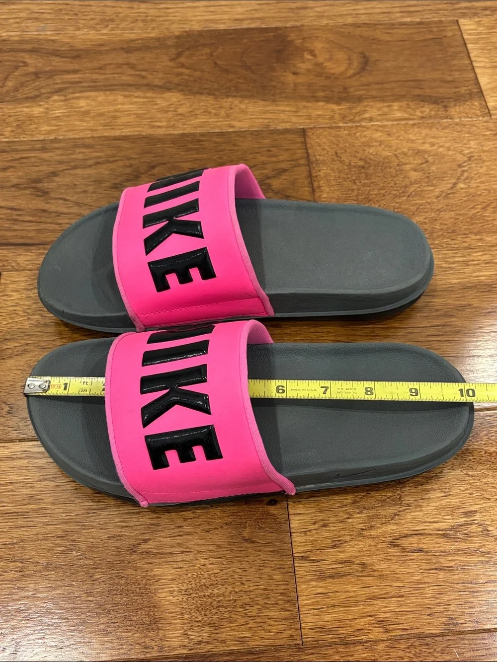Nike Women’s Pink and Gray Slide Sandals with Bold Logo